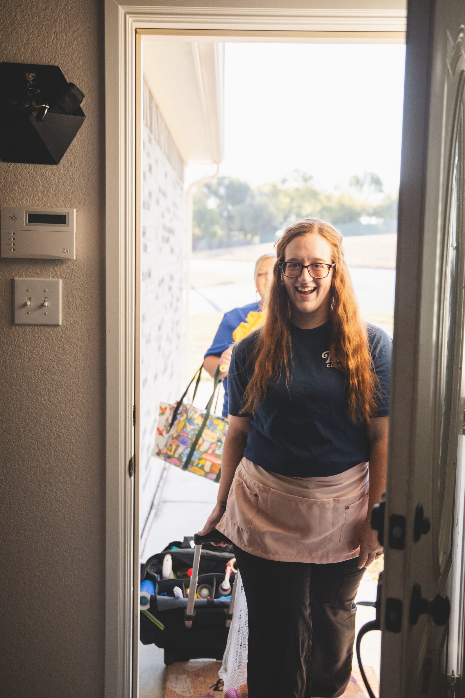 Friendly cleaning crew from The Mop & Broom arriving at a home in Haltom City to provide cleaning services
