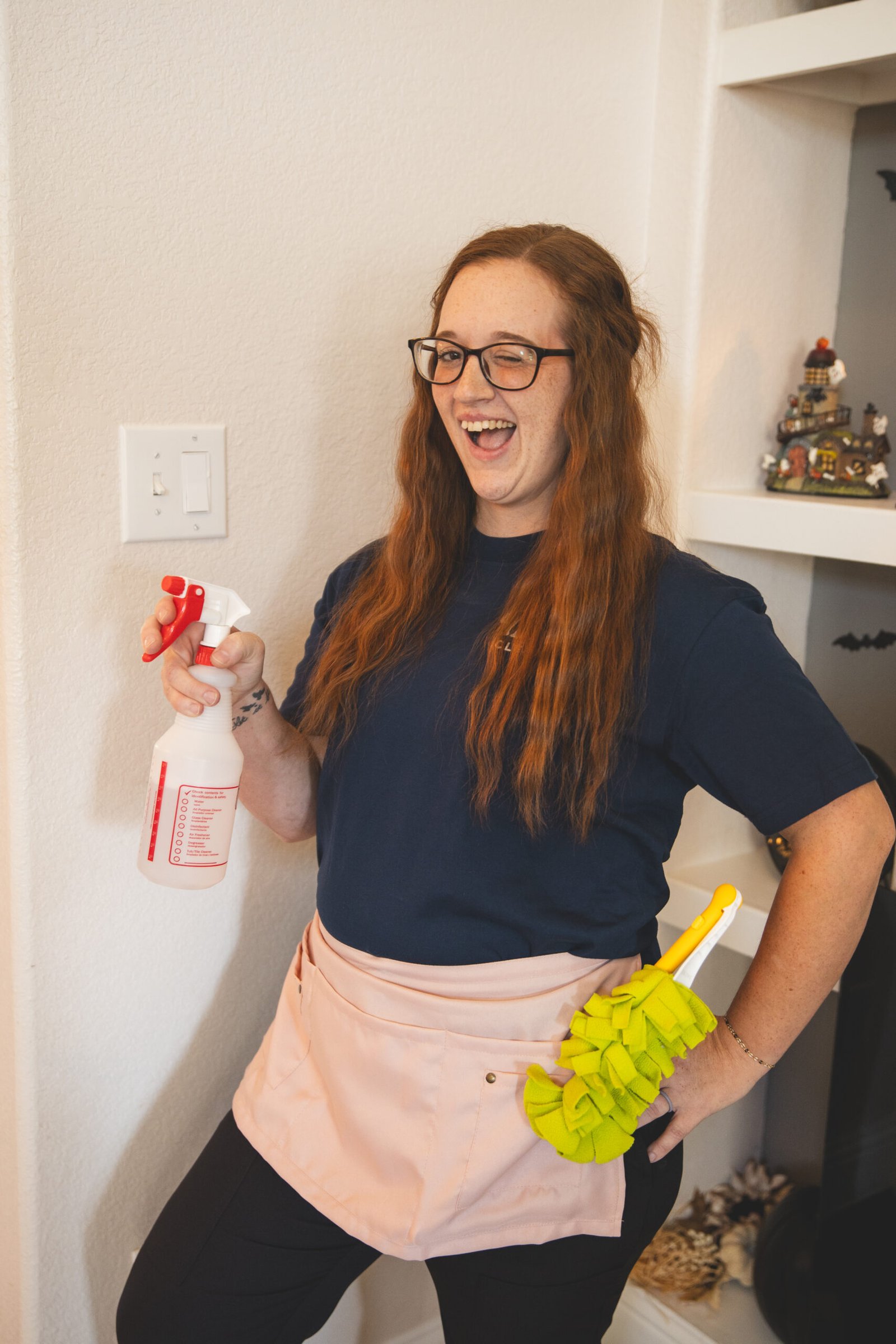 Friendly staff member from The Mop & Broom cleaning company near me, ready to assist with cleaning services