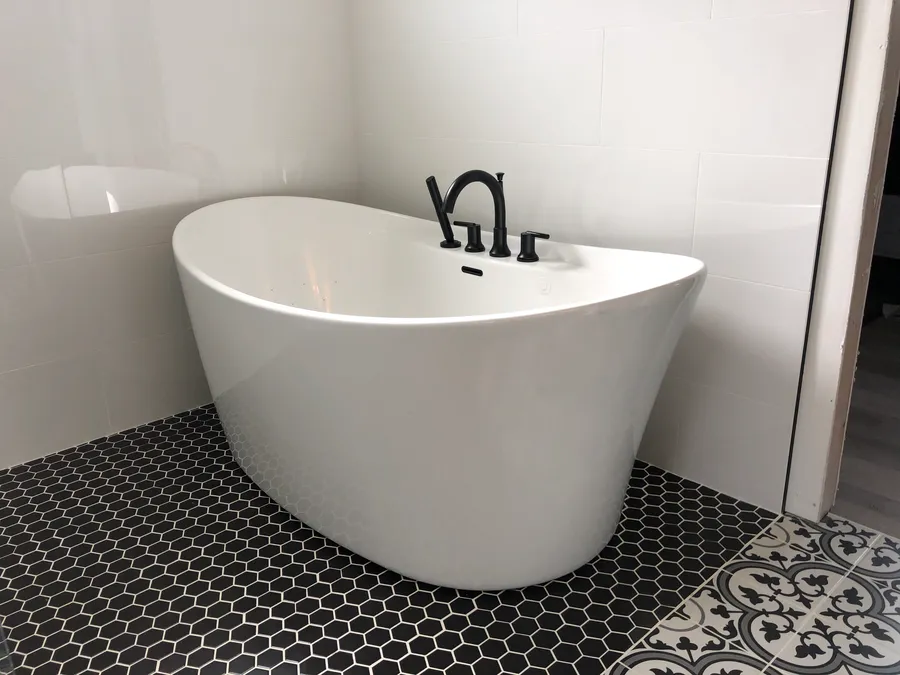 Freestanding tub installed during a bathroom remodel
